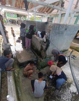 Dokumentasi KKN-TI Universitas Halu Oleo di Desa Bakealu Tahun 2024